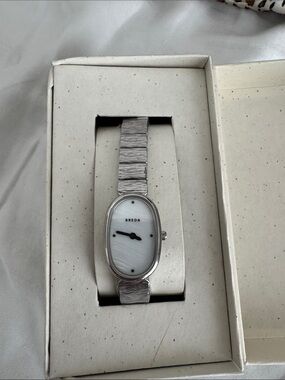 BREDA Silver Oval Women's Dress Watch with White Dial